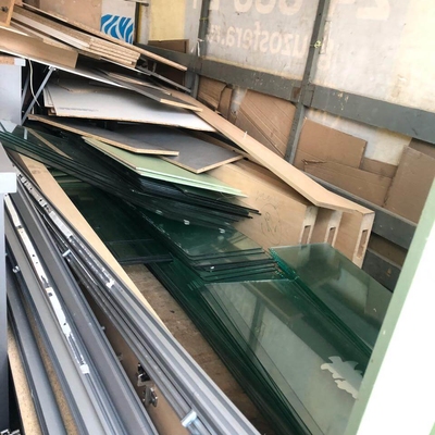 Стекло, доски и картон в кузове газели